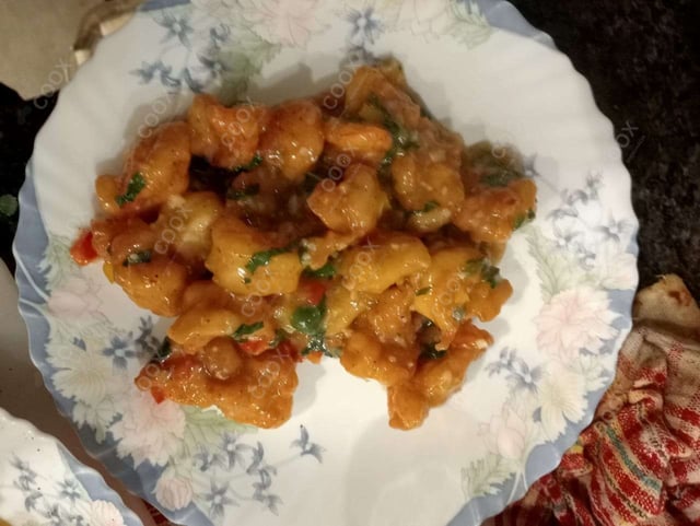 Delicious Butter Garlic Prawns prepared by COOX