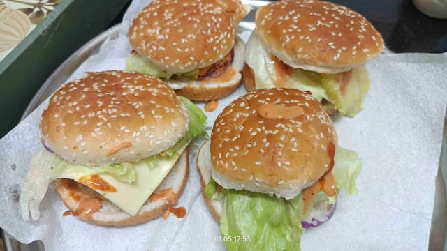 Delicious Mini Veg Burgers prepared by COOX