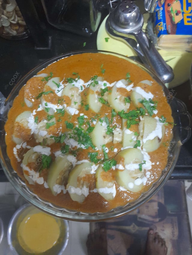 Delicious Stuffed Potatoes (Gravy) prepared by COOX