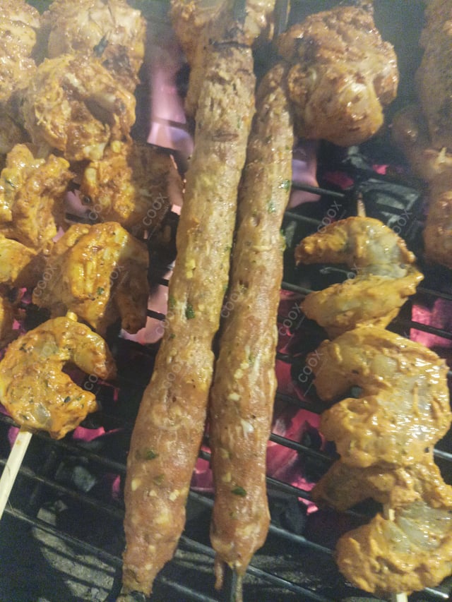 Delicious Mutton Seekh Kebab prepared by COOX