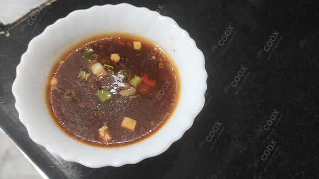 Delicious Vegetable Manchow Soup prepared by COOX