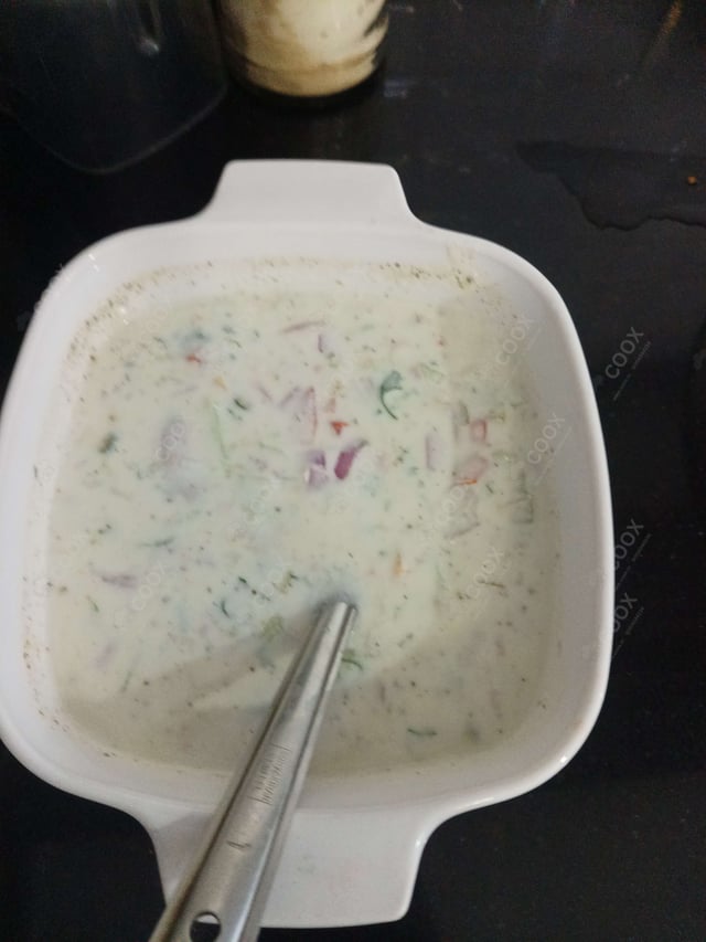 Delicious Mix Veg Raita prepared by COOX