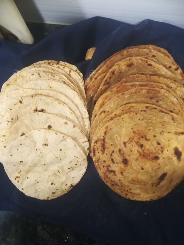 Delicious Lachha Parantha & Roti prepared by COOX