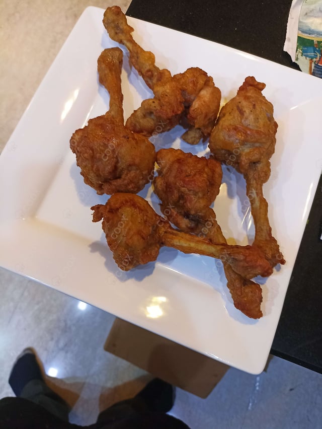 Delicious Chicken Lollipop prepared by COOX