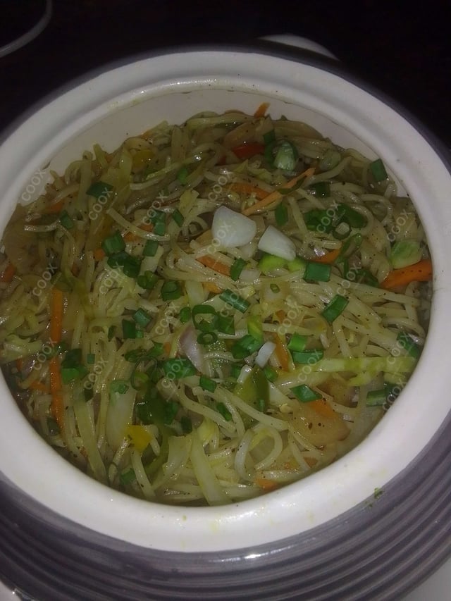 Delicious Veg Hakka Noodles prepared by COOX