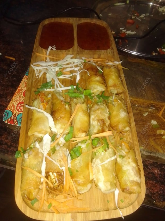 Delicious Veg Spring Rolls prepared by COOX