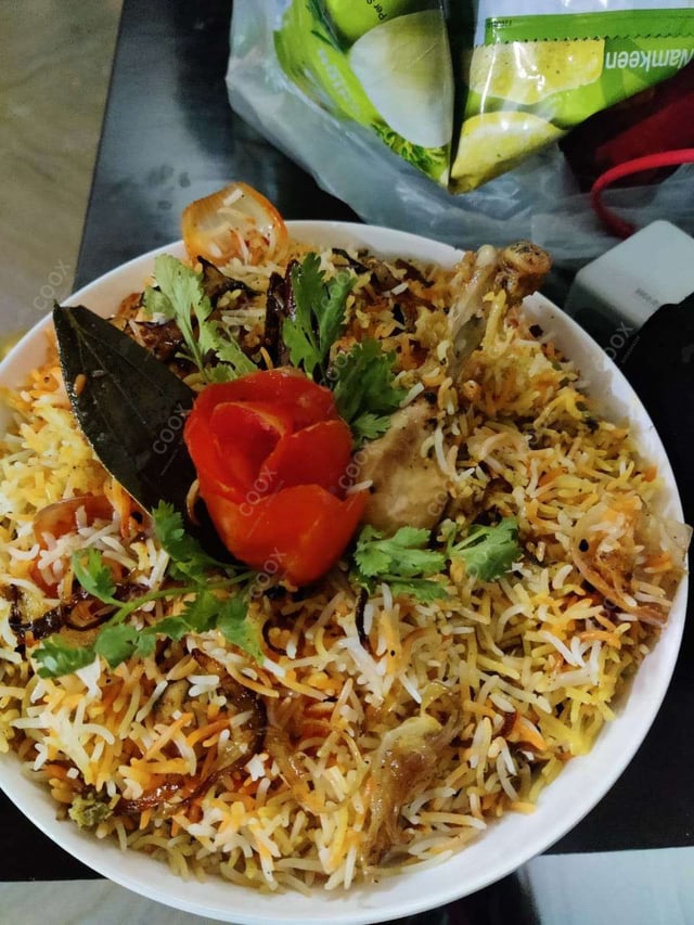 Delicious Chicken Biryani prepared by COOX