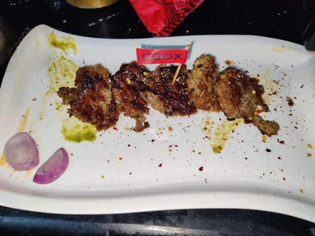 Delicious Mutton Seekh Kebab prepared by COOX