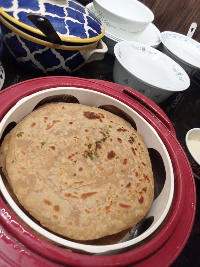 Delicious Lachha Paranthas prepared by COOX