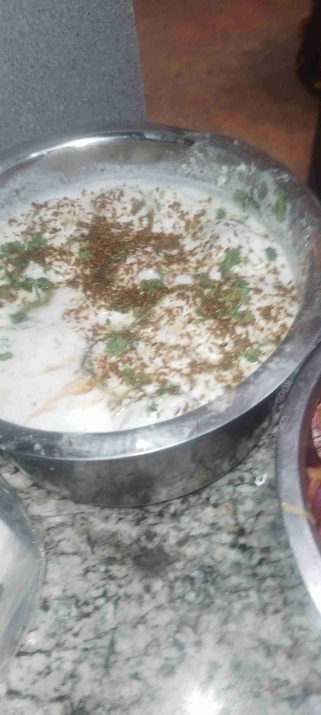 Delicious Dahi Bhalla prepared by COOX