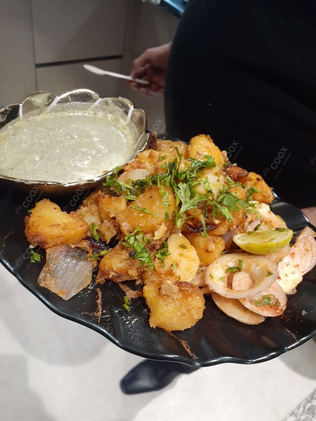 Delicious Tandoori Aloo prepared by COOX