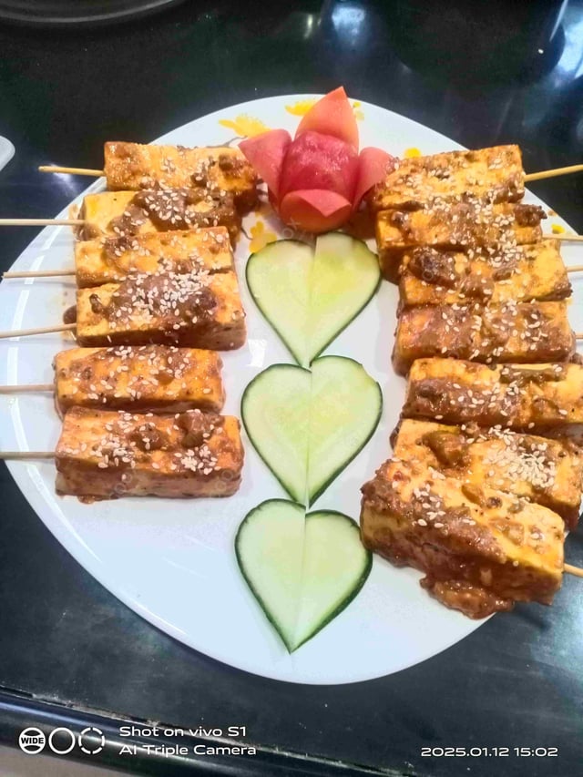 Delicious Thai Paneer Satay prepared by COOX