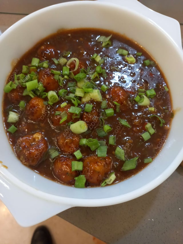 Delicious Veg Manchurian (Dry) prepared by COOX