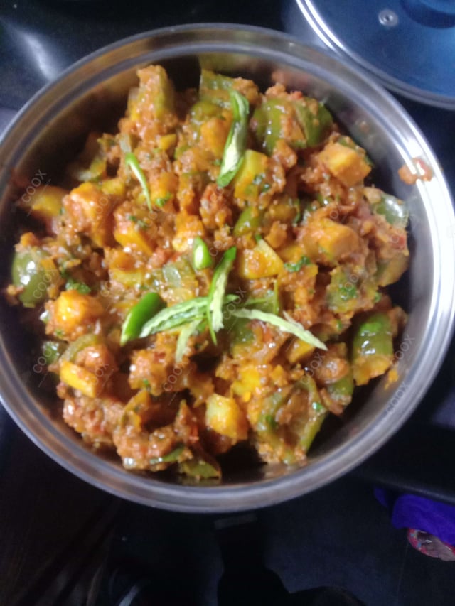 Delicious Aloo Shimla Mirch prepared by COOX