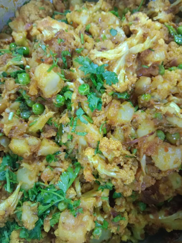 Delicious Gobhi Matar prepared by COOX