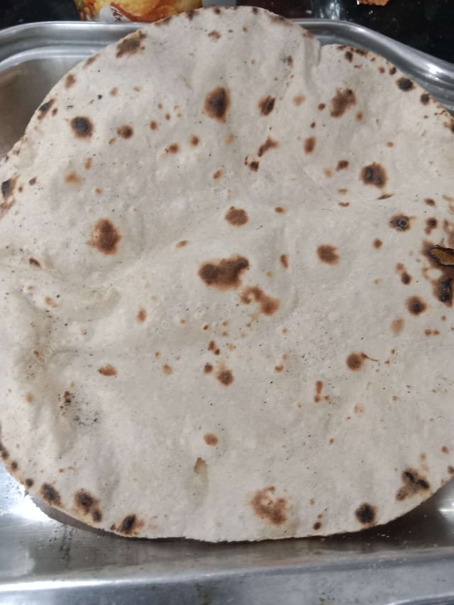 Delicious Tawa Rotis prepared by COOX