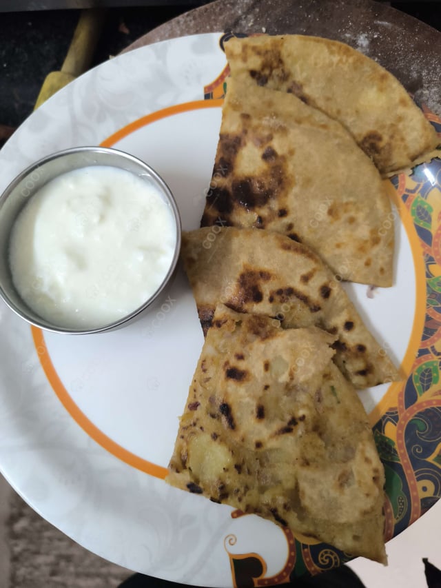 Delicious Stuffed Paranthas prepared by COOX