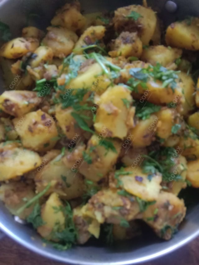 Delicious Jeera Aloo prepared by COOX