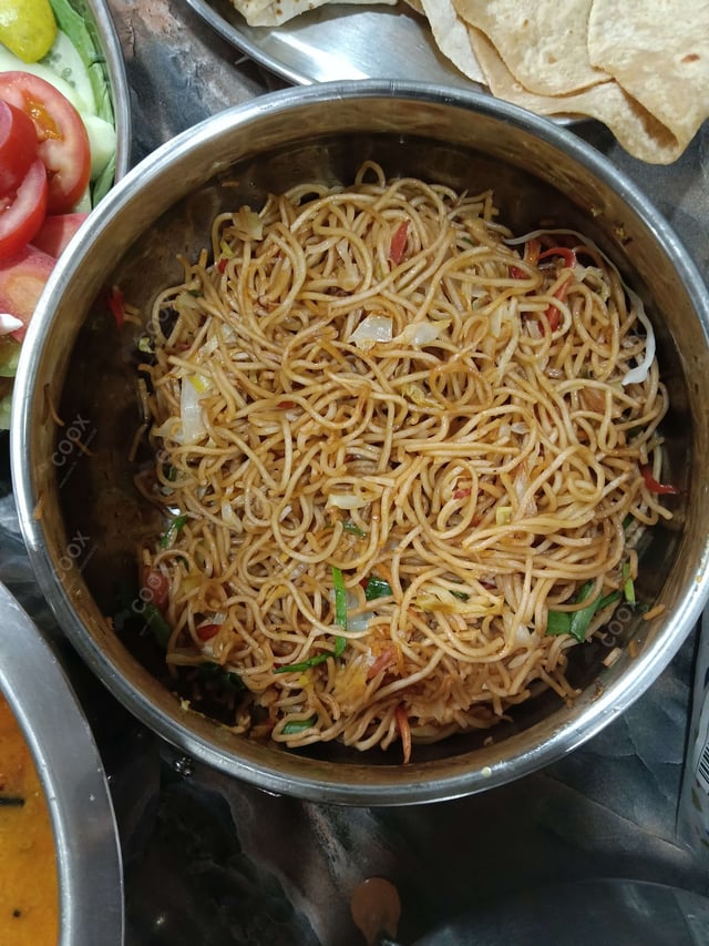 Delicious Veg Hakka Noodles prepared by COOX