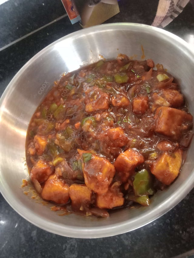 Delicious Chilli Paneer (Gravy) prepared by COOX