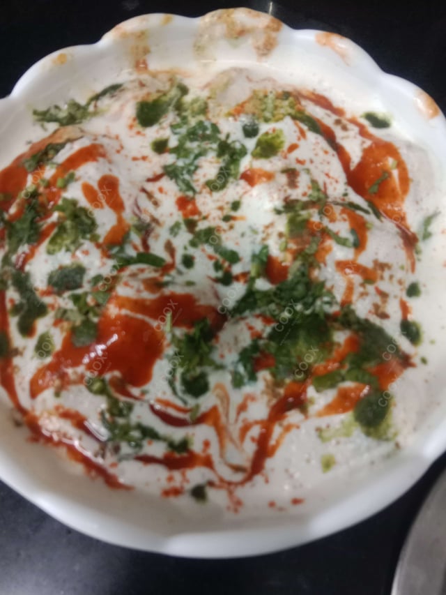 Delicious Dahi Bhalla prepared by COOX