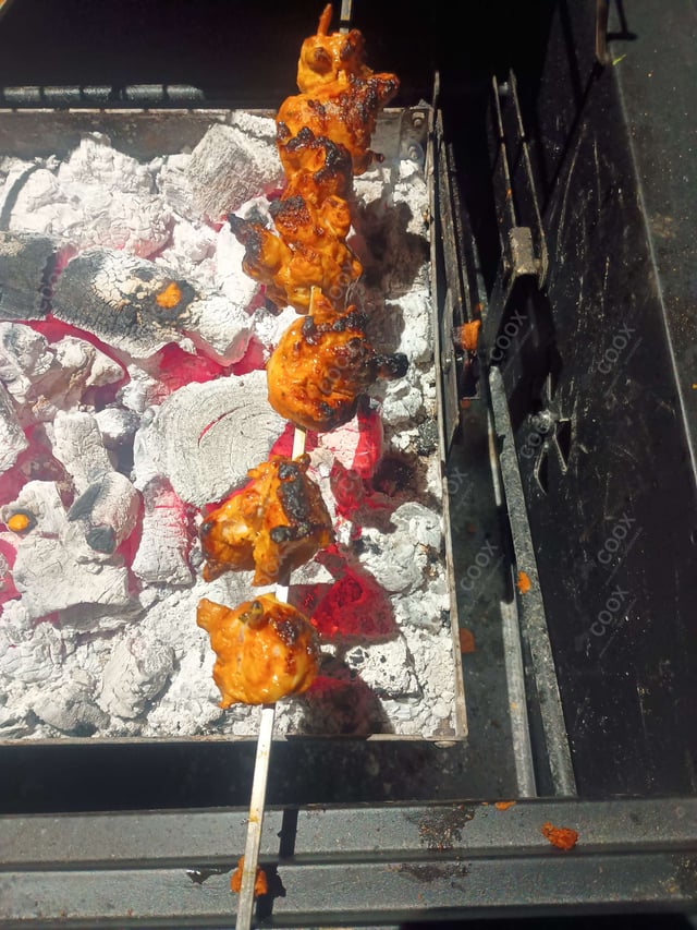 Delicious Murgh Malai Tikka prepared by COOX