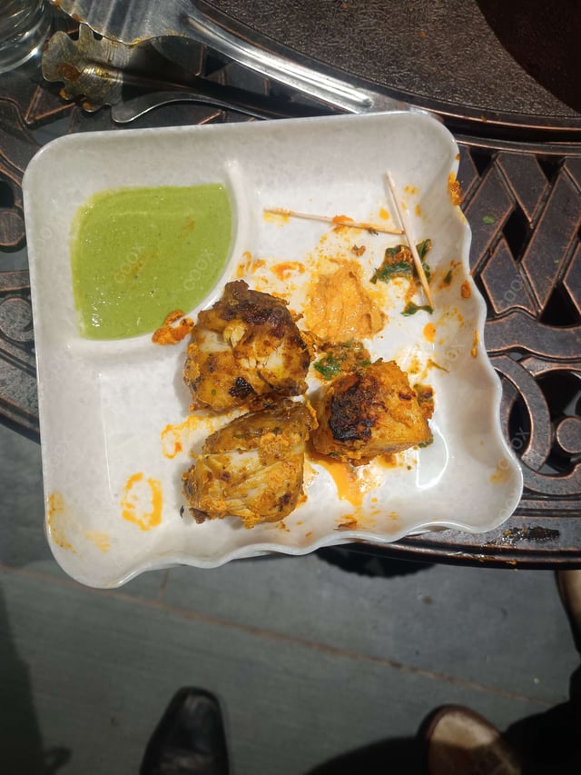 Delicious Fish Tikka prepared by COOX