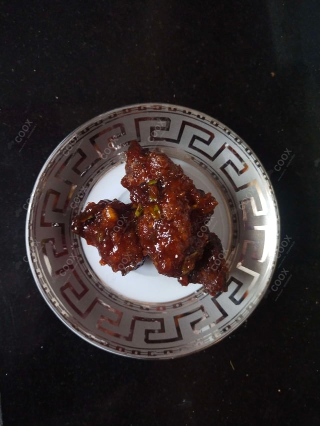 Delicious Chilli Chicken prepared by COOX