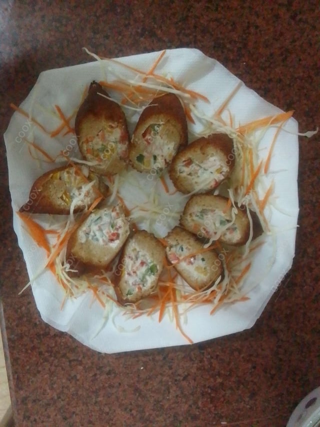 Delicious Dahi ke Sholey prepared by COOX