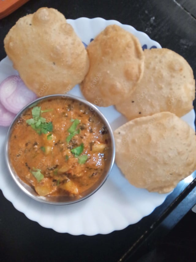 Delicious Poori Bhaji prepared by COOX