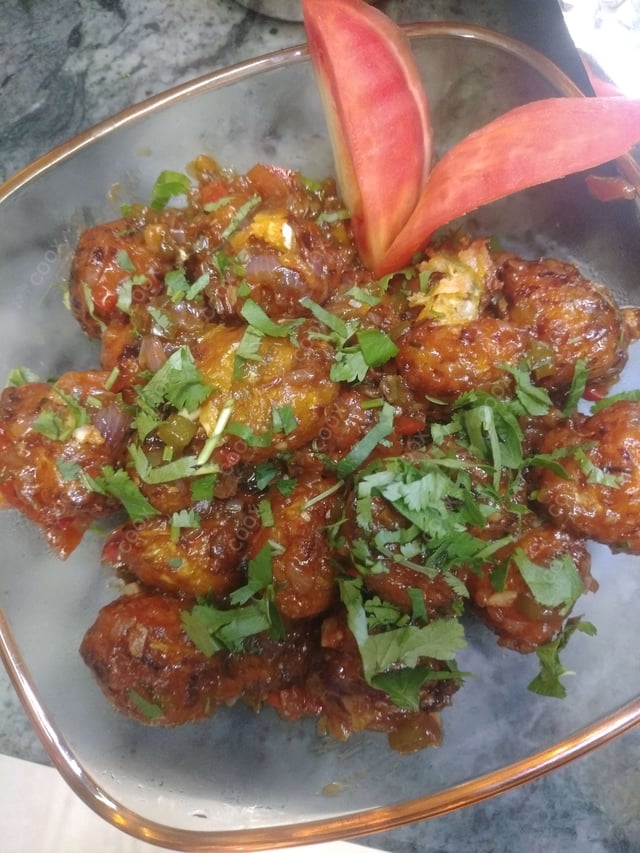 Delicious Veg Manchurian (Dry) prepared by COOX