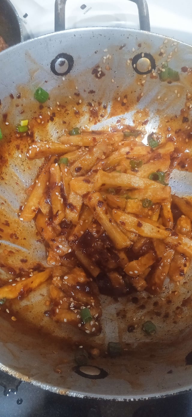 Delicious Honey Chilli Potato prepared by COOX