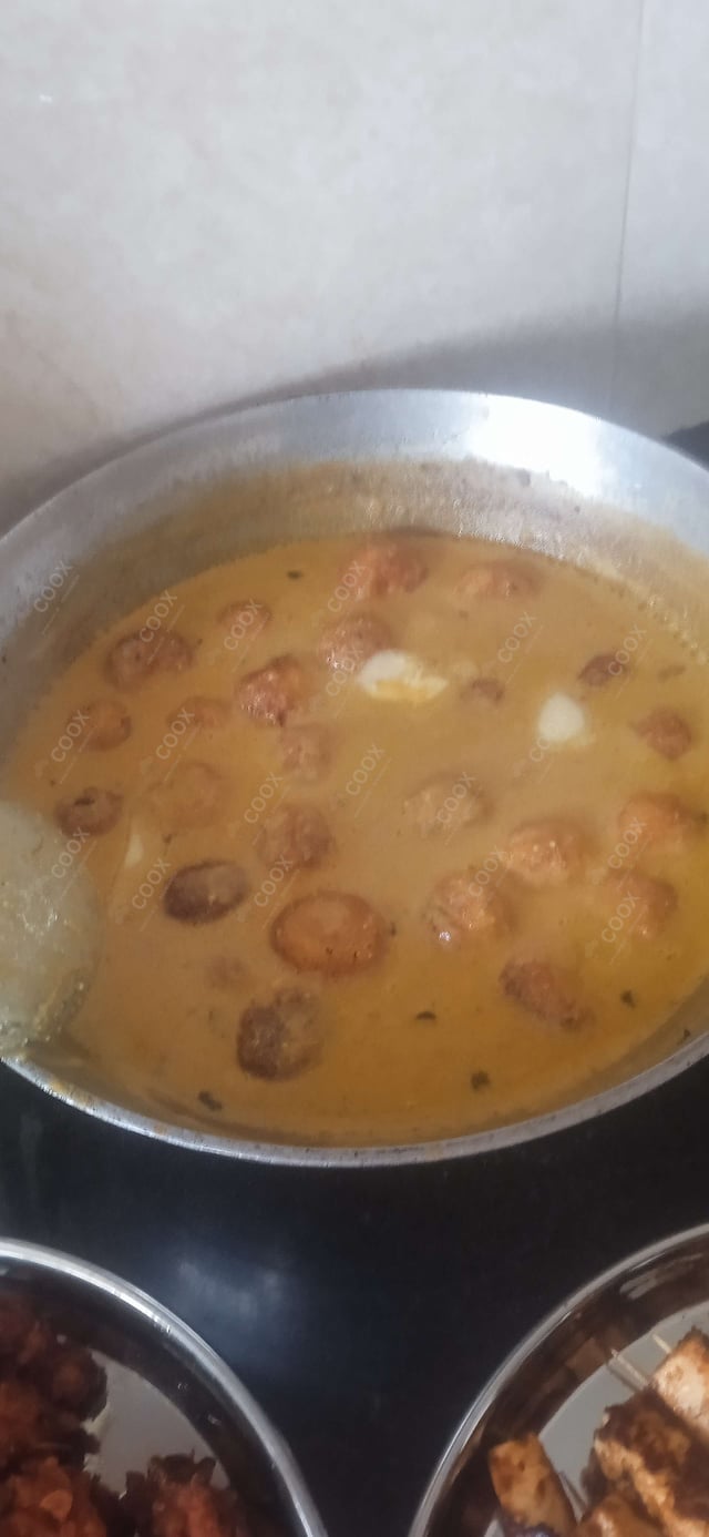 Delicious Malai Kofta (Orange Gravy) prepared by COOX