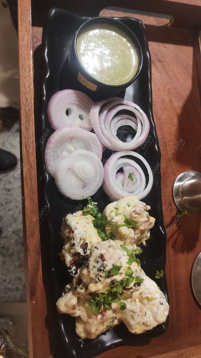 Delicious Murgh Malai Tikka prepared by COOX