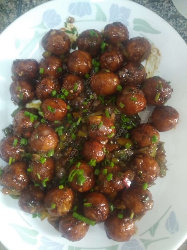 Delicious Veg Manchurian (Dry) prepared by COOX