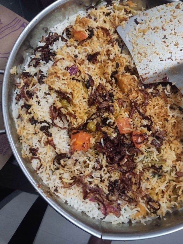 Delicious Veg Biryani prepared by COOX