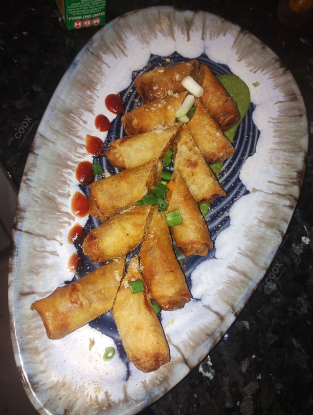 Delicious Veg Spring Rolls prepared by COOX