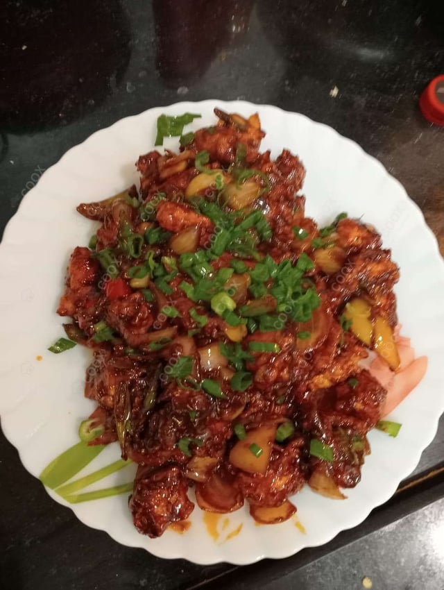 Delicious Chilli  Chicken prepared by COOX