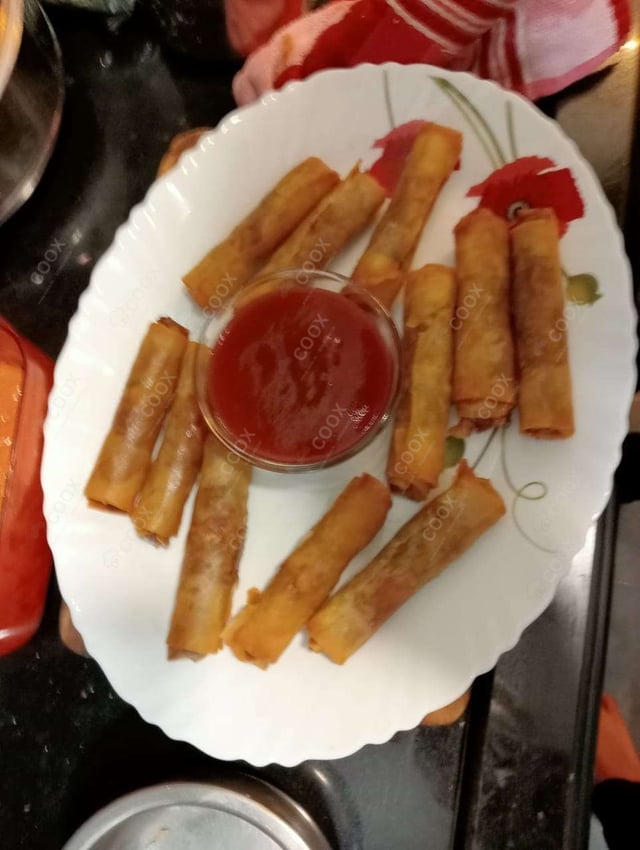 Delicious Veg Spring Rolls prepared by COOX