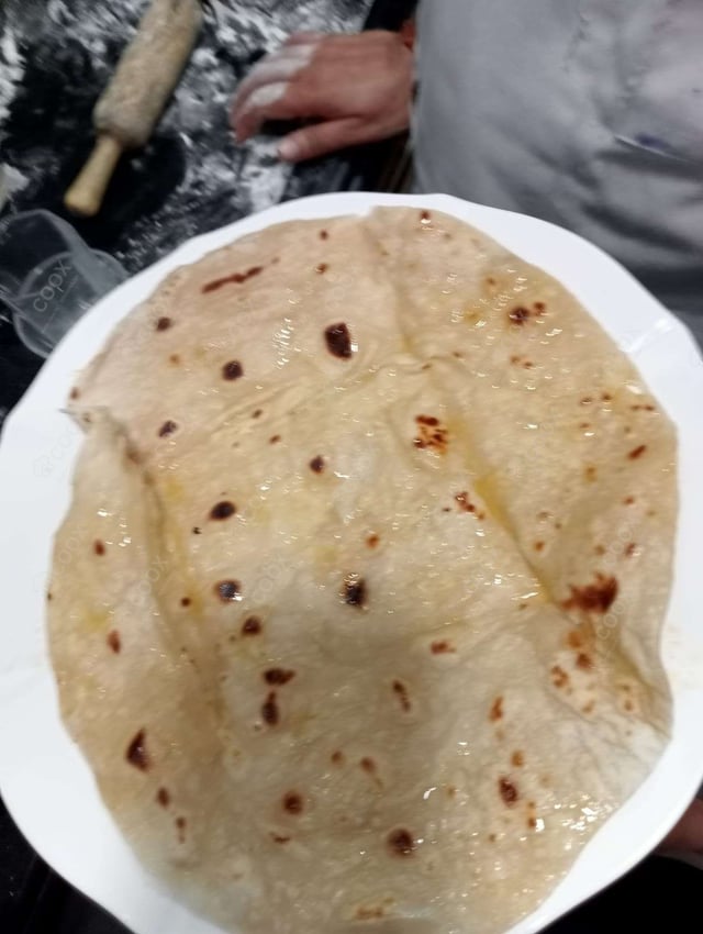 Delicious Rumali Rotis prepared by COOX