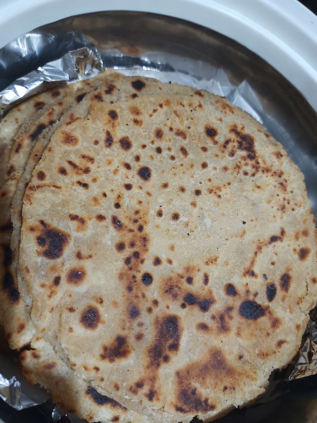 Delicious Lachha Parathas prepared by COOX