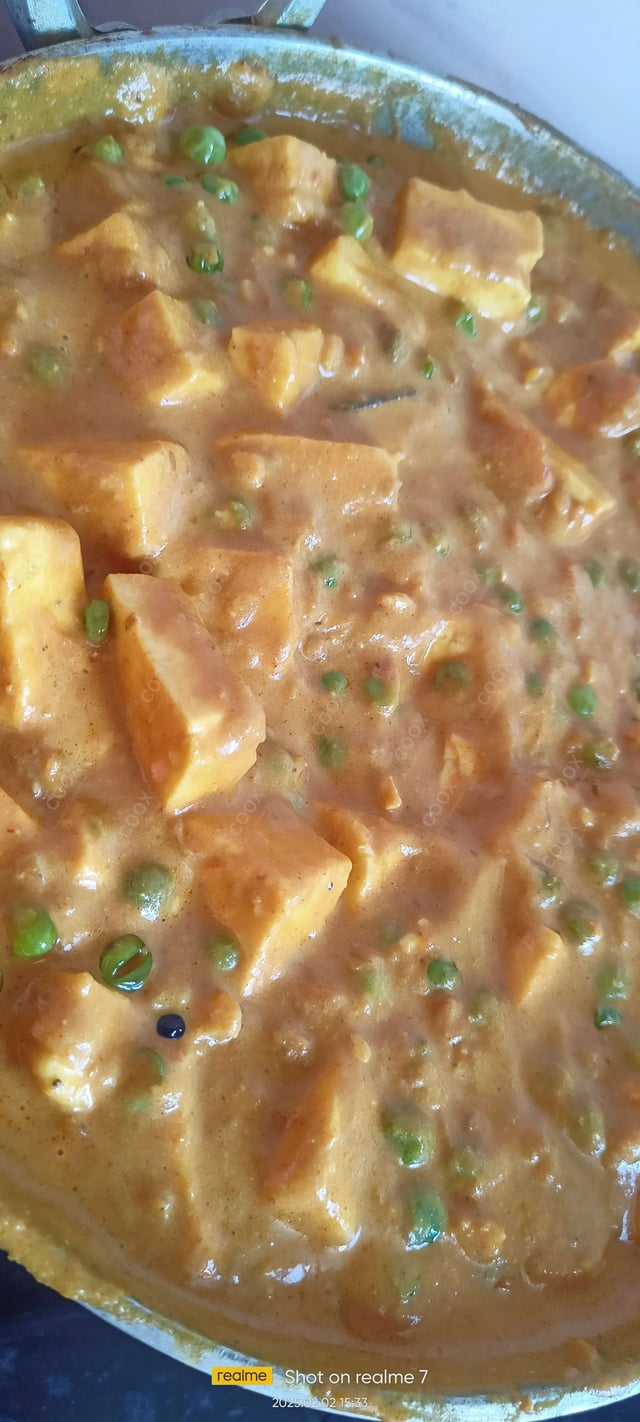 Delicious Matar Paneer prepared by COOX