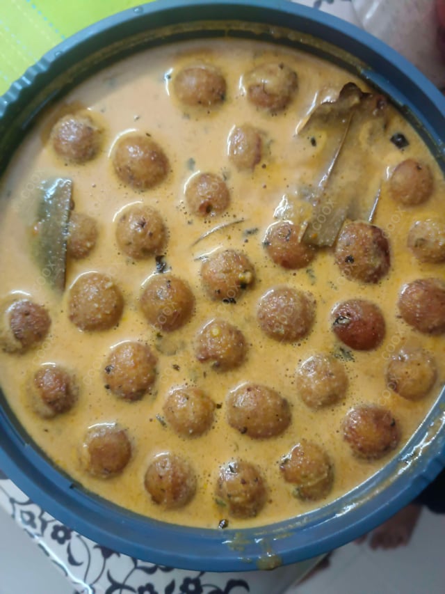 Delicious Malai Kofta (Orange Gravy) prepared by COOX