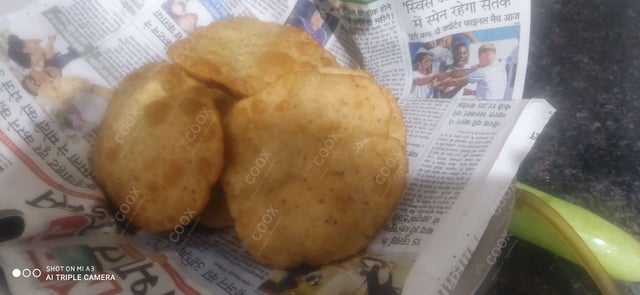 Delicious Poori & Bedmi prepared by COOX