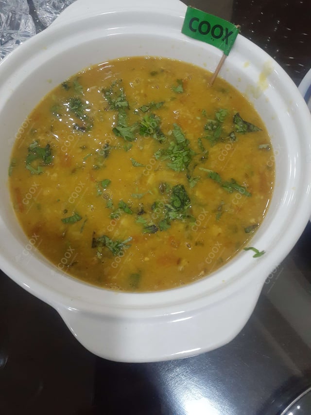 Delicious Dal Tadka prepared by COOX