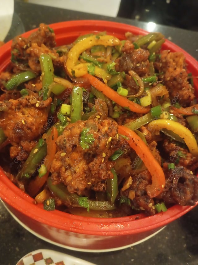 Delicious Crispy Chilli Lamb prepared by COOX