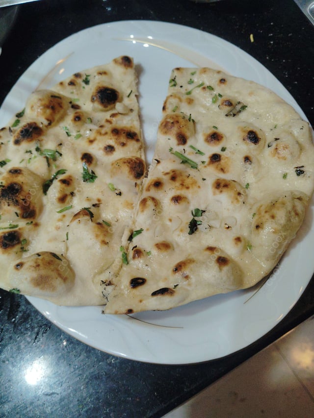 Delicious Naan (Butter / Garlic) prepared by COOX