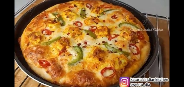 Delicious Veg Pizza prepared by COOX