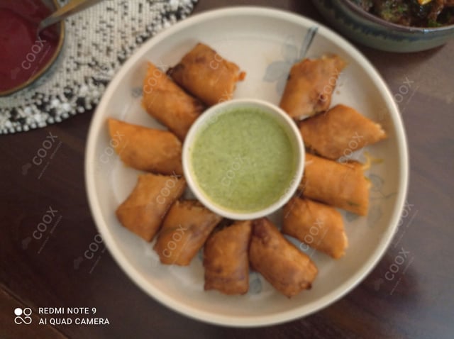 Delicious Veg Spring Rolls prepared by COOX