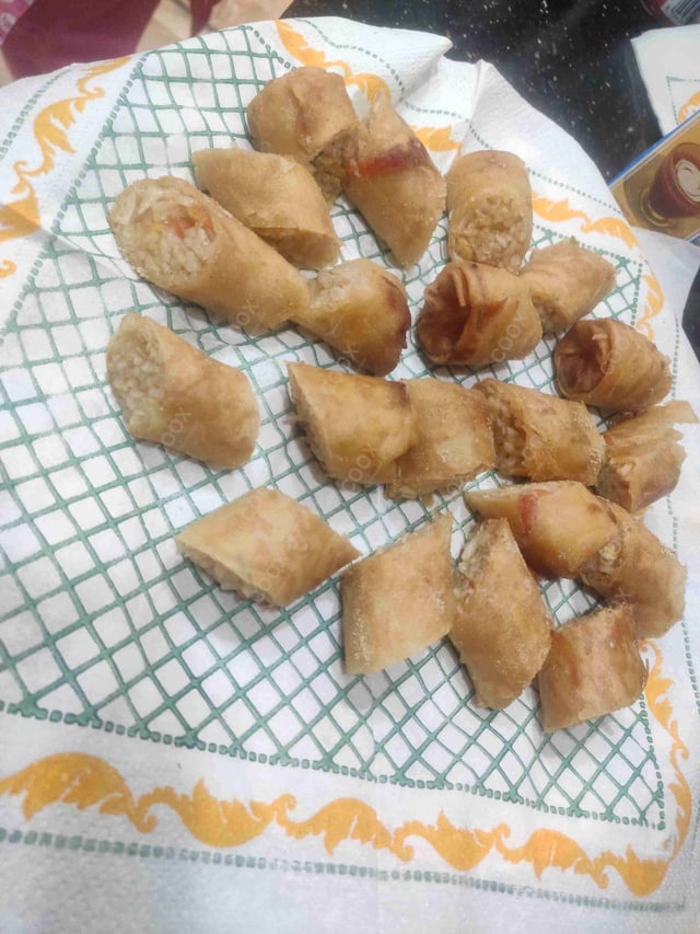 Delicious Chicken Spring Rolls prepared by COOX